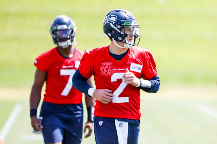 Seattle Seahawks quarterback Drew Lock (2) participates in a drill during an OTA workout at the Virginia Mason Athletic Center.